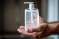 A bottle of liquid soap in hand Royalty Free Stock Photo