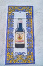 The bottle of Manzanilla Sherry wine on tile, Sanlucar, Spain Royalty Free Stock Photo