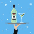 Bottle of martini and glass on tray on blue background Royalty Free Stock Photo