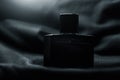 Bottle of men perfume and grey cloth