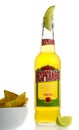 Bottle of Mexican Desperados Tequila beer with lime wedge and na
