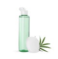 Bottle of micellar cleansing water, cotton pads and green twig on white background Royalty Free Stock Photo