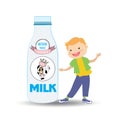 A bottle of milk and cow`s label and smiley cute boy