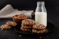 Bottle of milk and homemade whole grain cookies