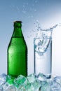 Bottle of mineral water with ice Royalty Free Stock Photo