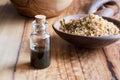 A bottle of myrrh essential oil with myrrh resin Royalty Free Stock Photo