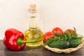 Bottle with oil, paprika and tomatoes, cucumbers, dill Royalty Free Stock Photo