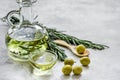 Bottle with olive oil and herbs on stone background mockup Royalty Free Stock Photo