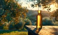 A bottle of olive oil stands on a rustic wooden table Royalty Free Stock Photo