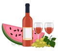 Bottle of orange wine, wine in glasses, watermelon and grape.