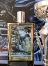 Bottle of perfume Calandre by Paco Rabanne, purposely blurred, selective focus