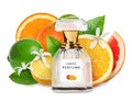 Bottle of perfume with citrus scent on white background