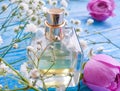 Bottle perfume elegance blossom designfashion atomizer aromatic flora on a colored background product scented fragrance