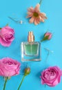 bottle perfume flower on a colored background aromatherapy