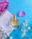 Bottle perfume flower luxury aromatic flora on a colored background product scented fragrance