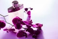 Bottle of perfume with orchid Royalty Free Stock Photo