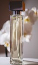 bottle with perfume on orchid flowers background Royalty Free Stock Photo