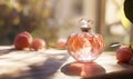 A bottle of perfume is on a table with a bunch of peaches Royalty Free Stock Photo