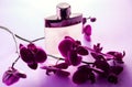 Bottle of perfume with orchid Royalty Free Stock Photo