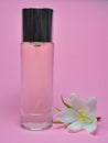 Bottle of perfume and white jasmine flower isolated