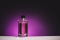 Bottle for perfume woman on lilac background