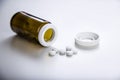 Bottle of pills with a lid, close up Royalty Free Stock Photo