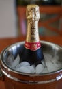 A bottle of Piper-Heidsieck Champagne in ice bucket