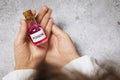 Bottle with poison in the hands of a medical professional. Illegal manufacture of toxic substances Royalty Free Stock Photo