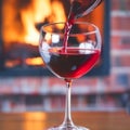 Bottle pouring into a wine glass with blurred background.