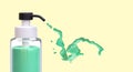Bottle with pump, green splashes. Sanitizer, soap, cream, gel