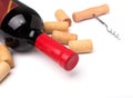 Bottle of red wine, corks and corkscrew Royalty Free Stock Photo
