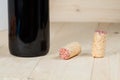 Bottle of red wine and corks Royalty Free Stock Photo