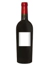 Bottle of red wine with an empty white label for copy writing. Red capsule on the bottle neck. Royalty Free Stock Photo