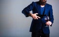 Bottle, red wine glass. Beard man, bearded, sommelier, tasting. Pouring red wine from bottle into the wineglass. Waiter Royalty Free Stock Photo