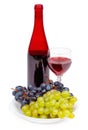 Bottle of red wine, glass and grapes Royalty Free Stock Photo