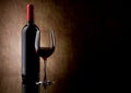 Bottle with red wine and glass and grapes Royalty Free Stock Photo