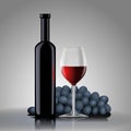 Bottle with red wine with a glass and grapes Royalty Free Stock Photo