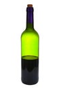 A bottle of red wine, half empty. Of green glass. Isolated. Royalty Free Stock Photo