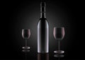 A bottle of red wine and two glasses on a black background Royalty Free Stock Photo