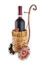 Bottle of red wine in wheeled basket Royalty Free Stock Photo