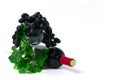 Bottle with red wine, wine glass with grapes, on a white background , no people, Royalty Free Stock Photo