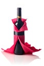 Bottle of red wine wrapped in crepe paper isolated on a white background Royalty Free Stock Photo