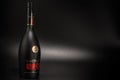 Bottle of Remy Martin cognac on black background