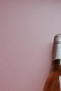 Bottle of rose champagne wine on pink background Royalty Free Stock Photo