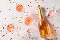 Bottle of rose sparkling wine on grey background Royalty Free Stock Photo