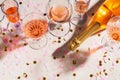 Bottle of rose sparkling wine on grey background Royalty Free Stock Photo