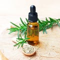 A bottle of rosemary aromatherapy oil extract