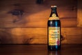 Bottle of Schlenkerla Brewery Bamberg Smoked Beer on Wood Background