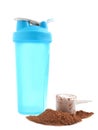 Bottle, scoop and pile of protein powder  on white Royalty Free Stock Photo