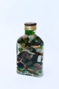 Bottle with sea pebbles Royalty Free Stock Photo